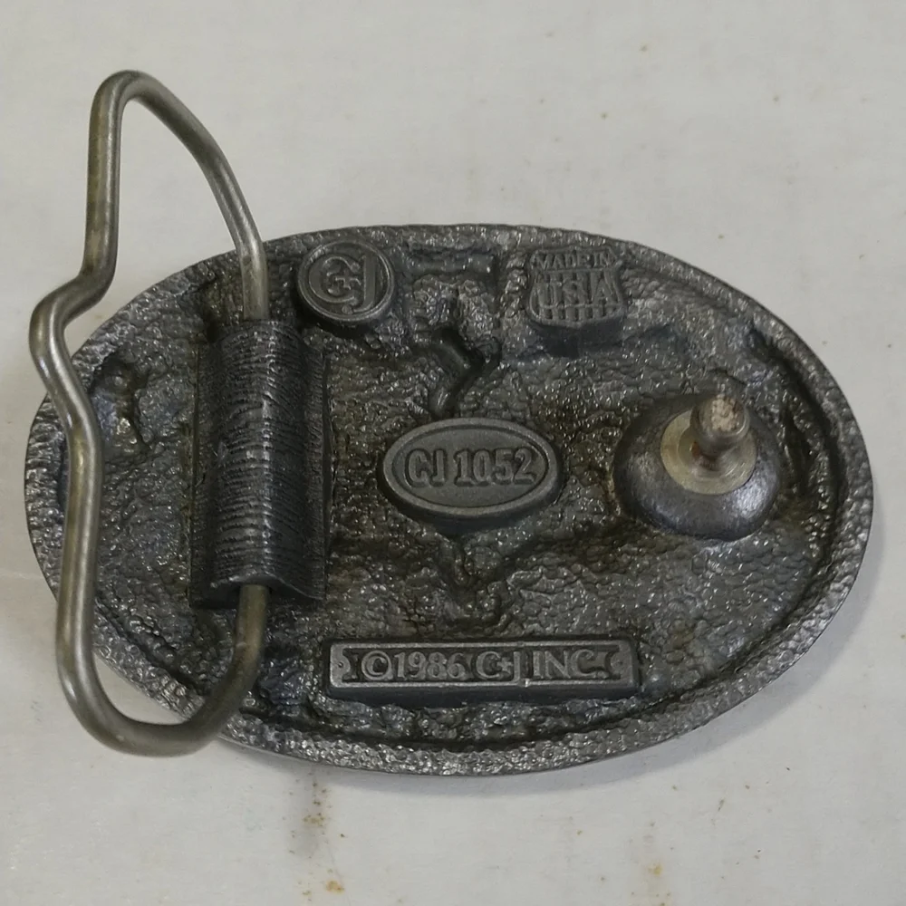 PARAMEDIC PEWTER BELT BUCKLE GREEN BACKGROUND 1986 USA